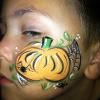 Pumpkin and spider web cheek art